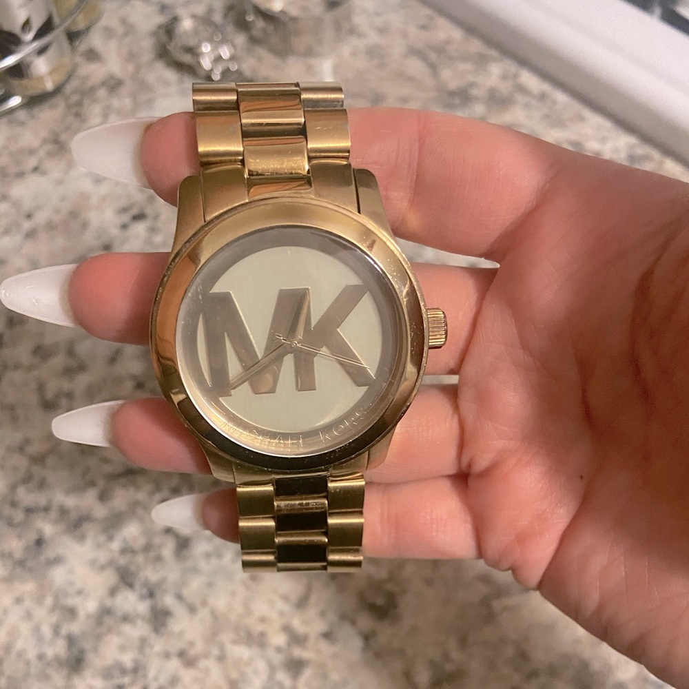 Unisex gold Michael kors watch
